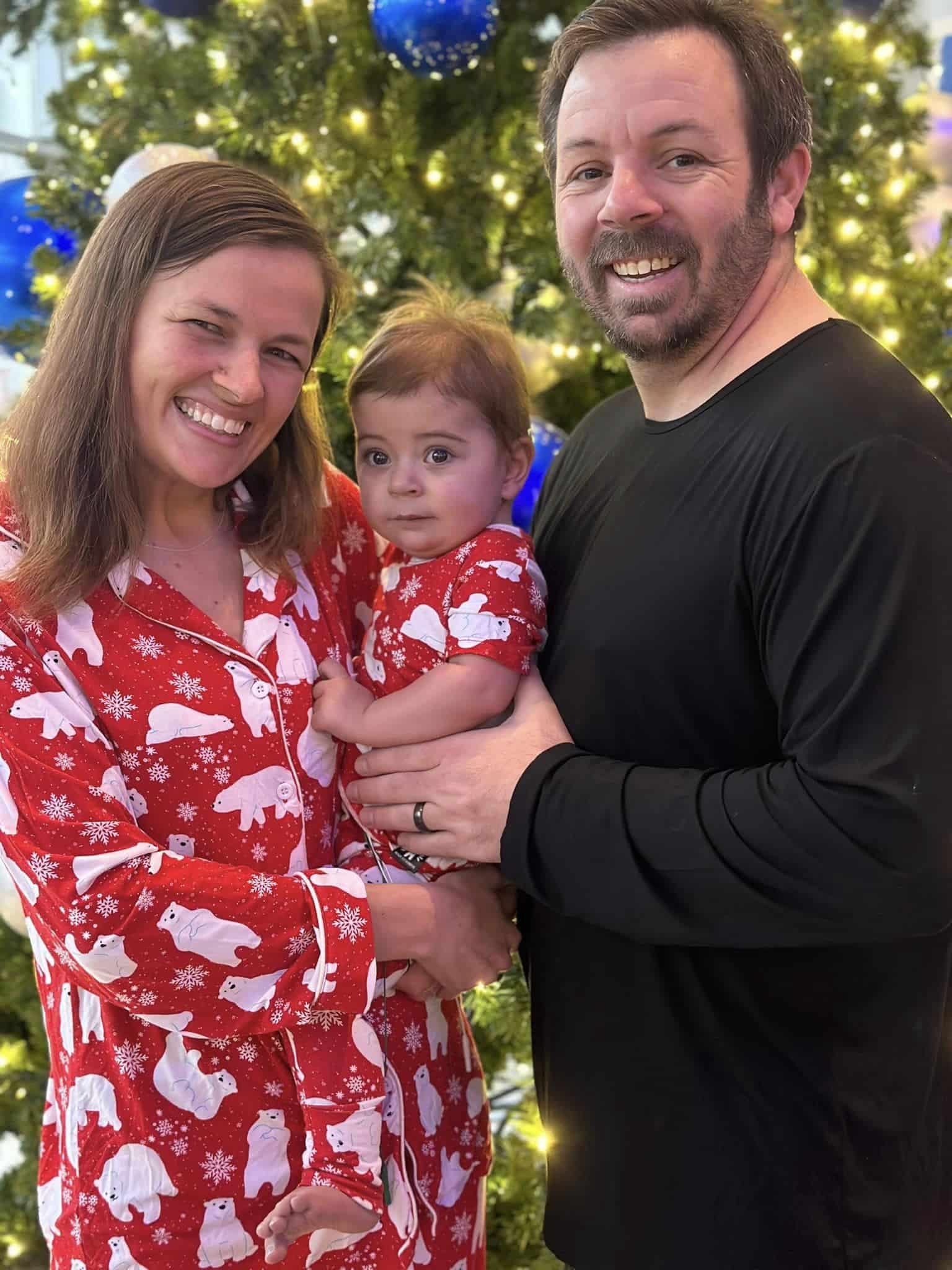 Tacktical Marketing | Full-Service Marketing Consulting Agency | About Us | About the owner | Image of the owner with his wife and daughter during christmas 2023
